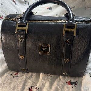 MCM Black Leather Duffel with Gold Hardware